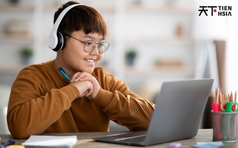 Student happily learning